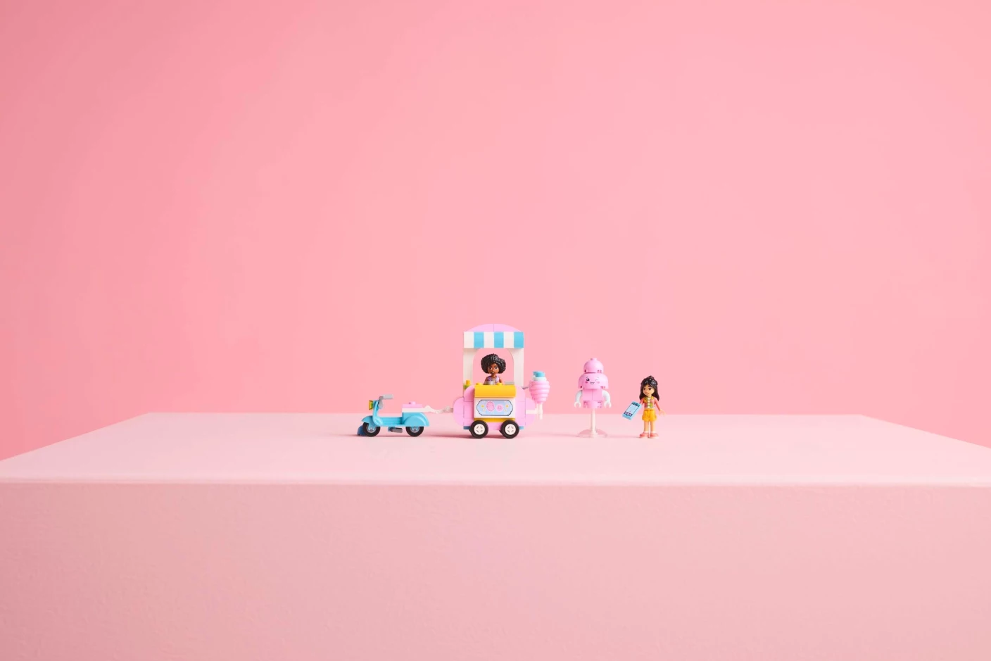 Suikerspinkraam en scooter