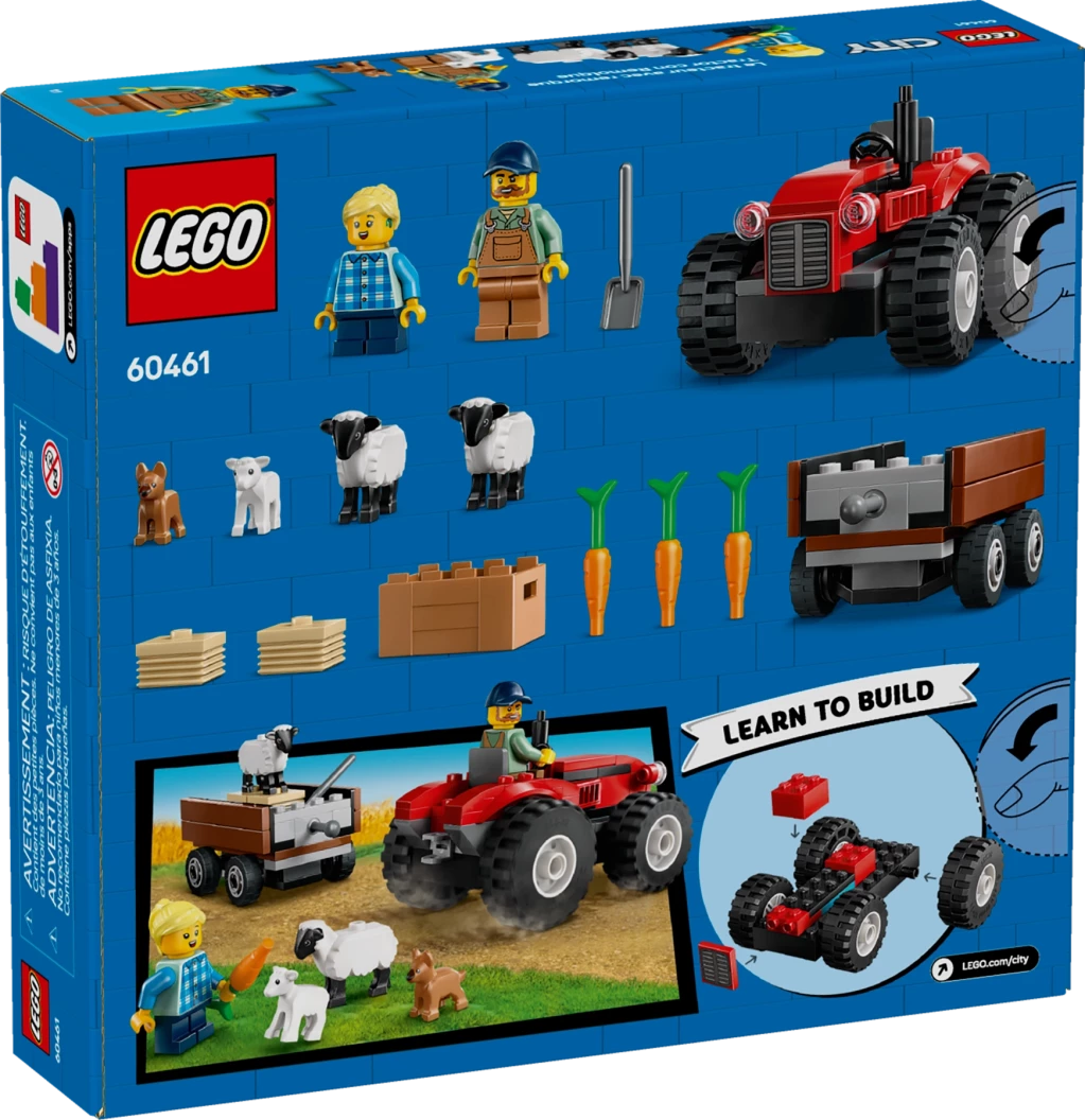Rode tractor met aanhanger en schapen