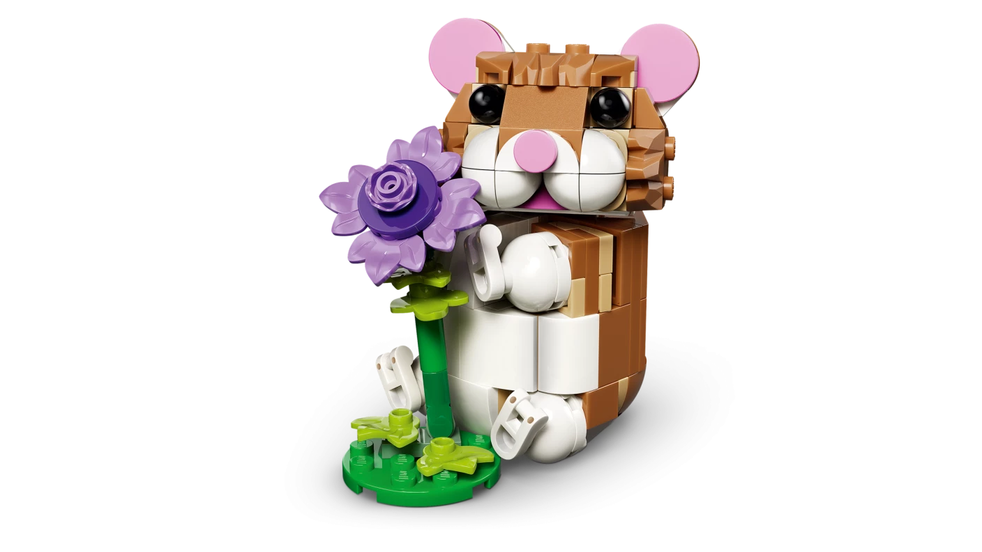 Schattige hamster met bloem