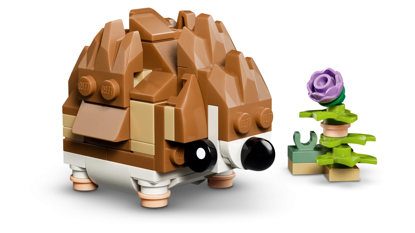 Schattige hamster met bloem