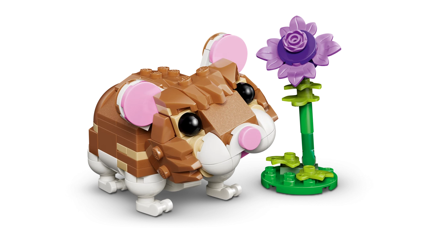 Schattige hamster met bloem