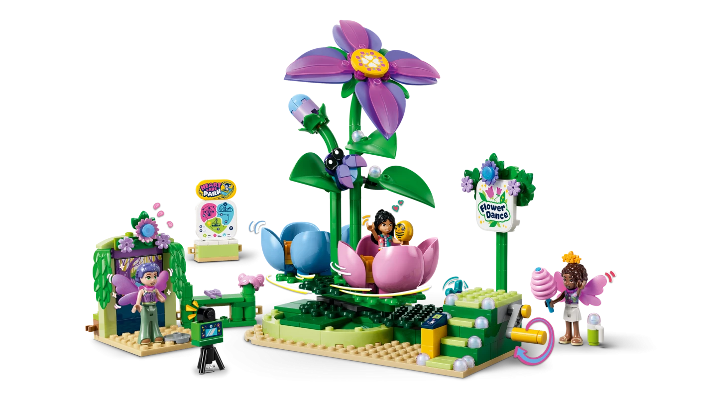 Draaiende theekopjesattractie met bloementhema