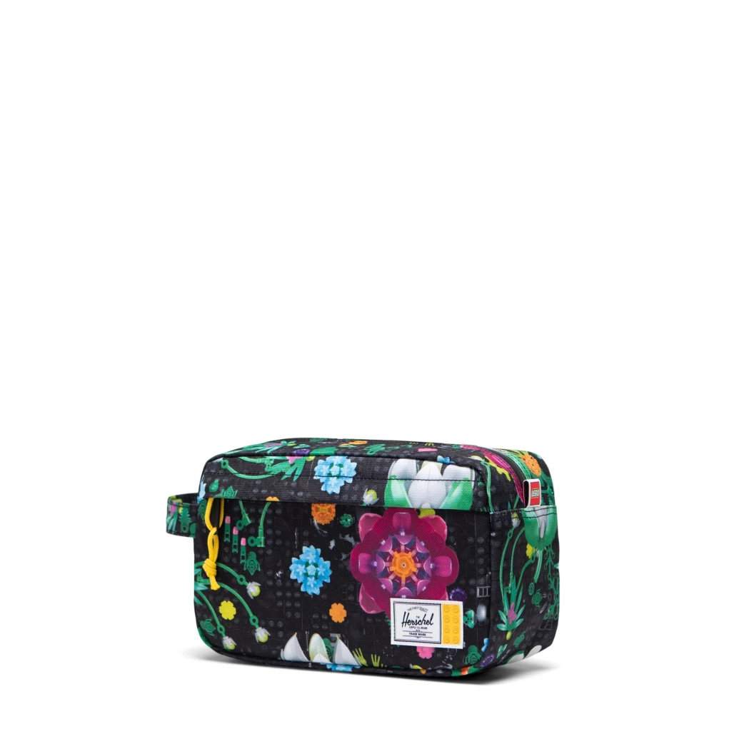 Herschel Chapter toilettas - vrolijke bloemen - zwart