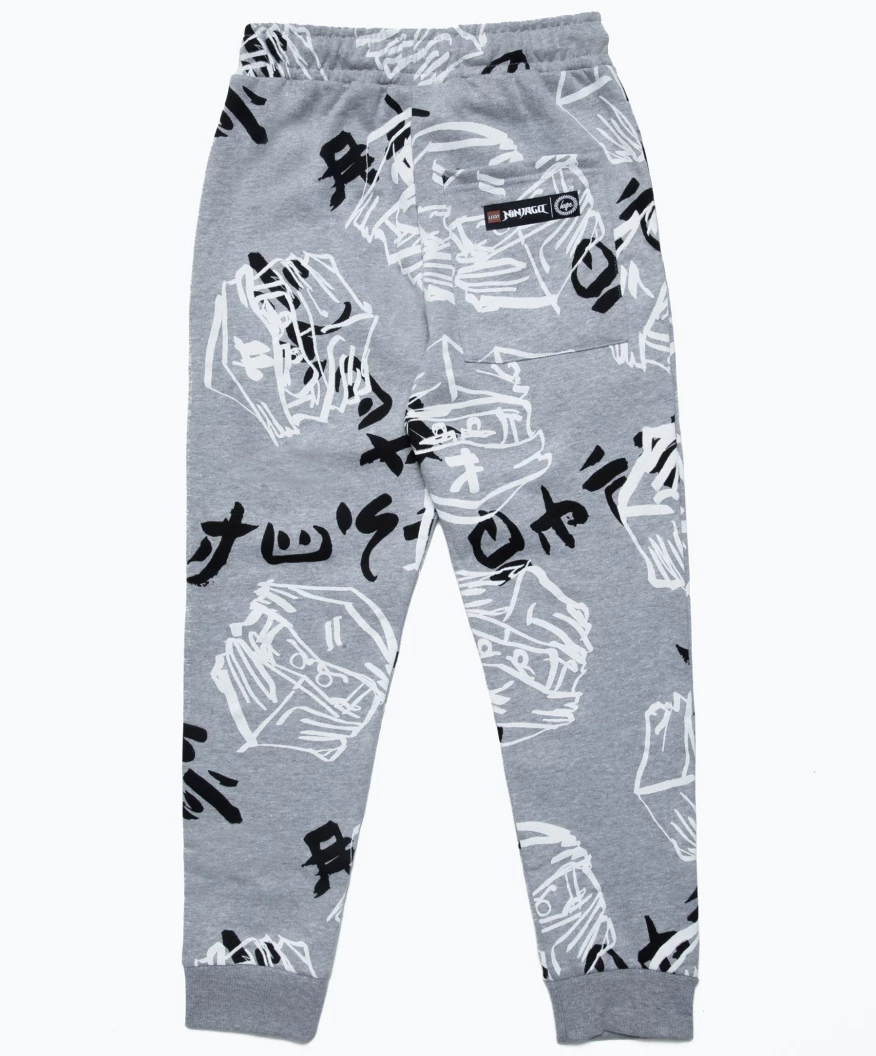 HYPE X LEGO® NINJAGO® grijze Just Hype joggingbroek met gezichten voor volwassenen