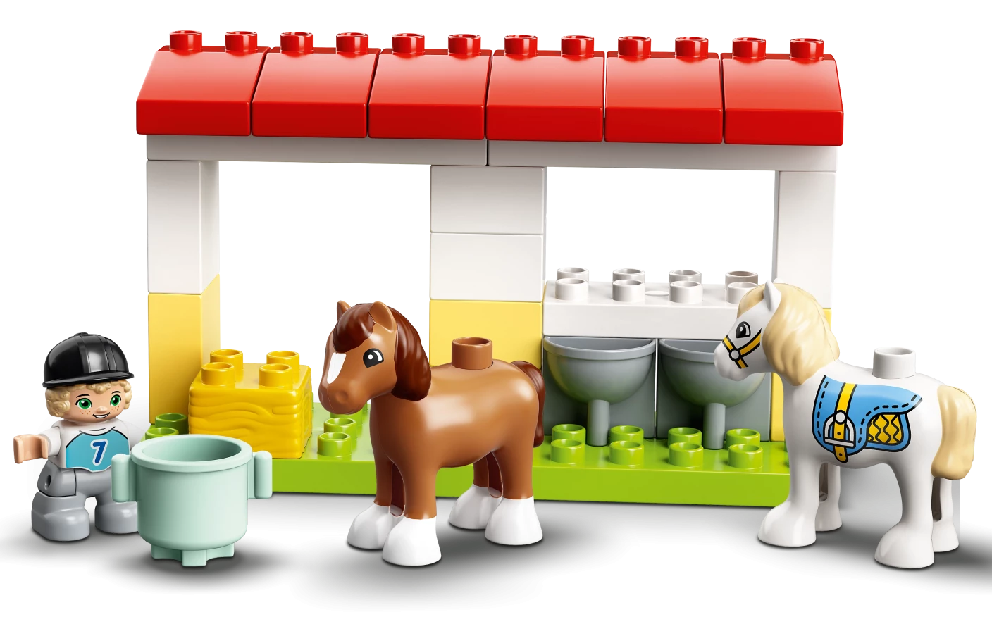 Paardenstal en pony's verzorgen